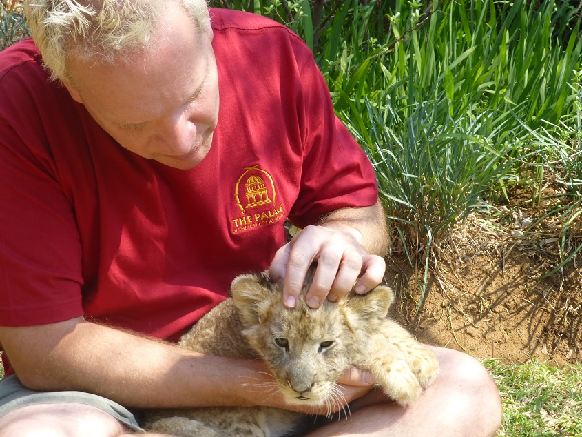 Petting lion cubs.  Photo by FG.