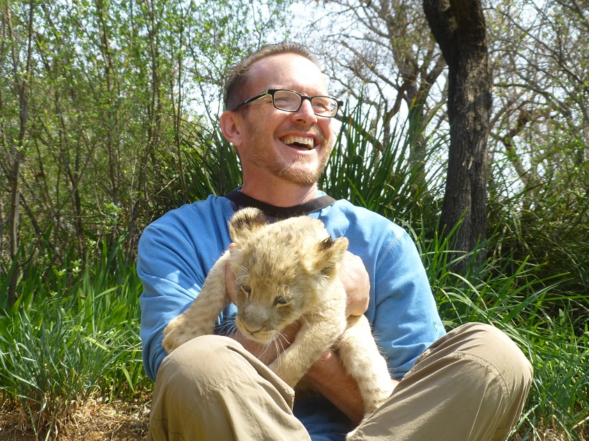 Petting lion cubs.  Photo by FG.