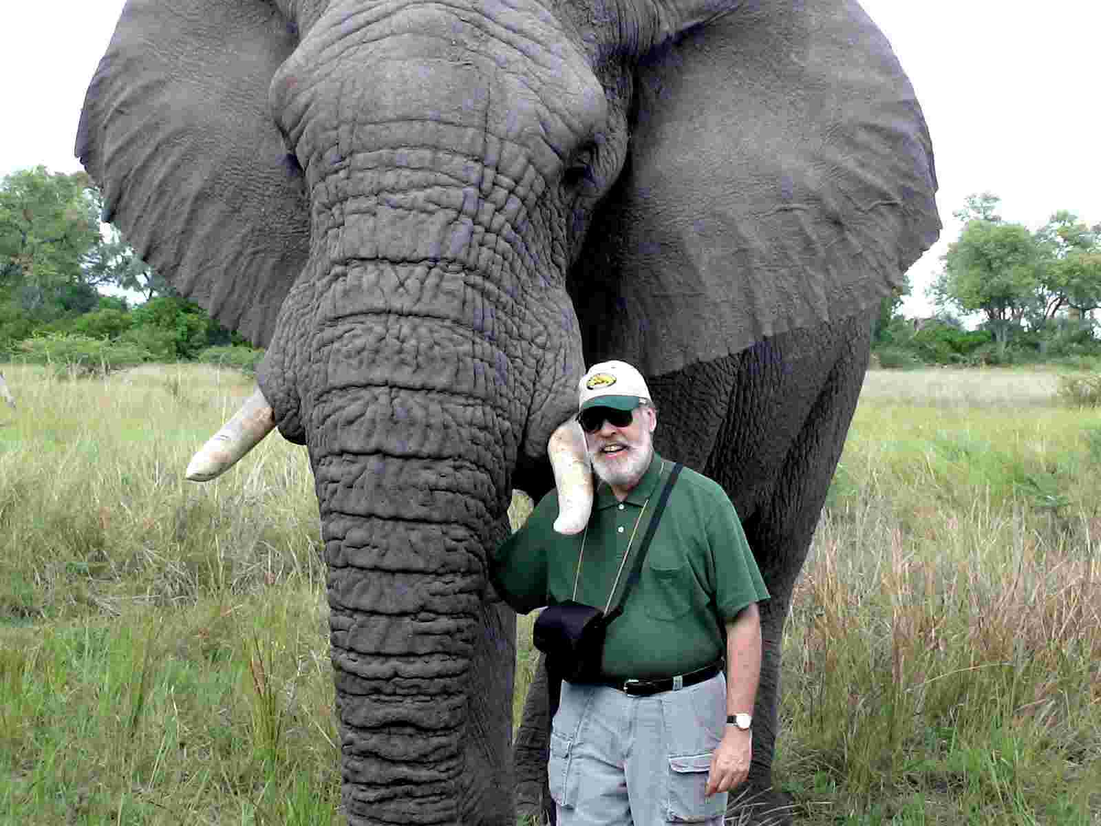 Jim poses with an elephant