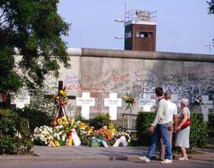 Crosses and memorials by the Berlin Wall.  Photo from the Internet.