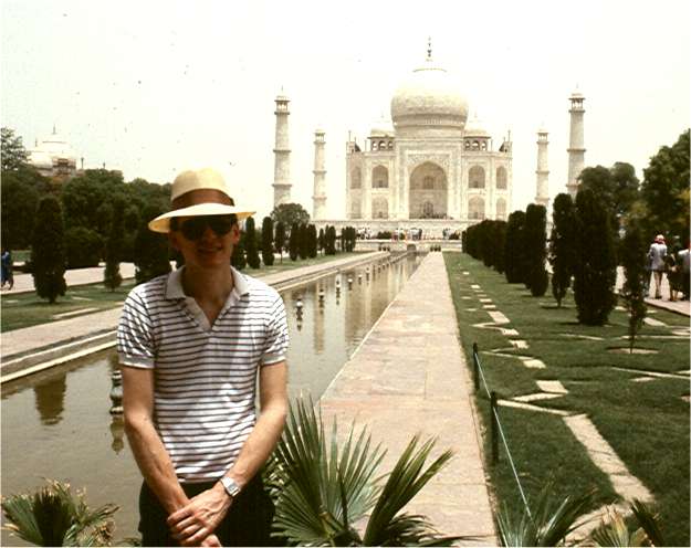 Bob poses for a picture in front of the Taj Mahal. Photo by FG.
