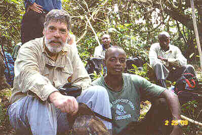 Jungle Jim catches his breath at the 'top'.  The altitude -- about 7000 feet -- adds to the difficulty of the climb.  Photo by one of the porters.